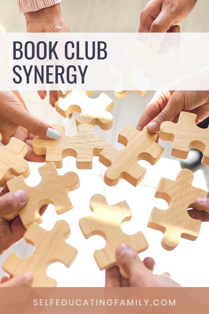 hands joining puzzle pieces with words book blub synergy