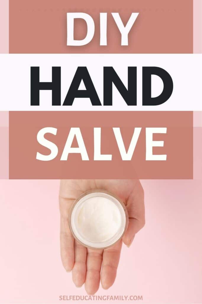 hand holding jar of salve