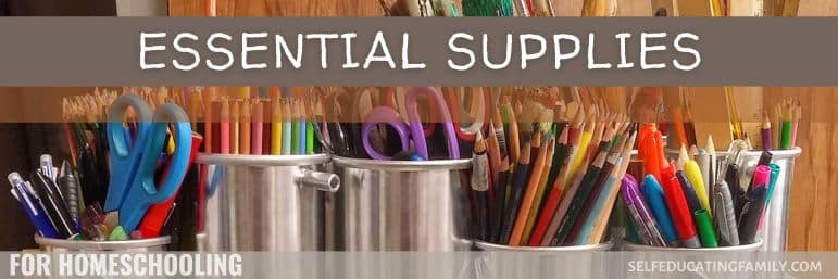 pens, markers, school supplies arranged neatly in matching containers