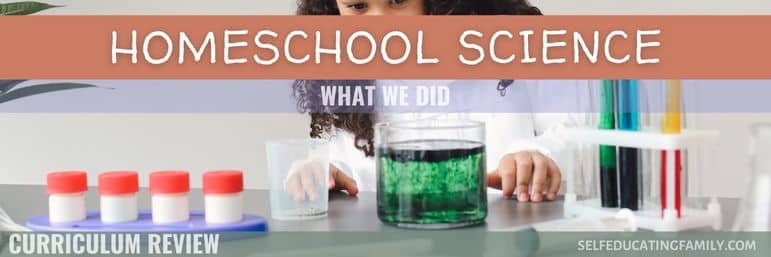 kid with science experiment, test tubes and jar of green liquid