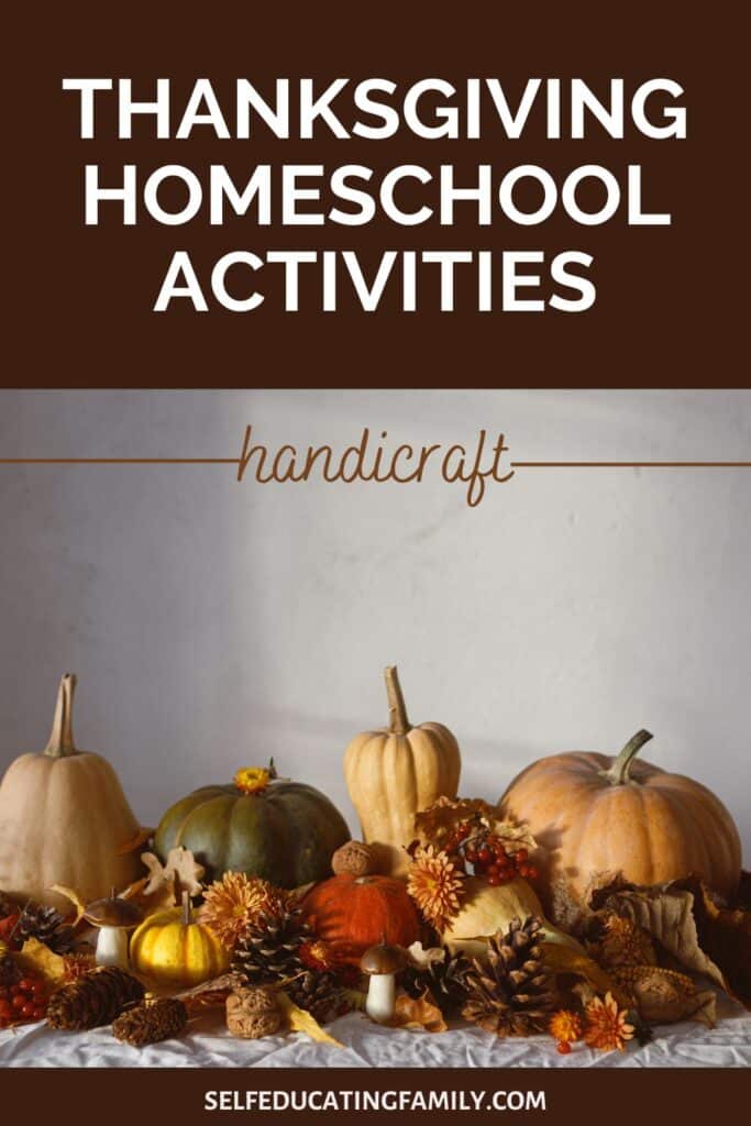 Thanksgiving themed table decorations with gourds, pine cones and fall flowers