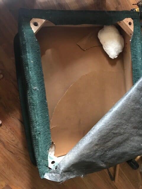 underside of broken ottoman
