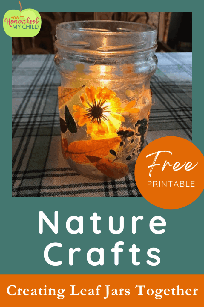 illuminated glass lantern with flowers and leaves