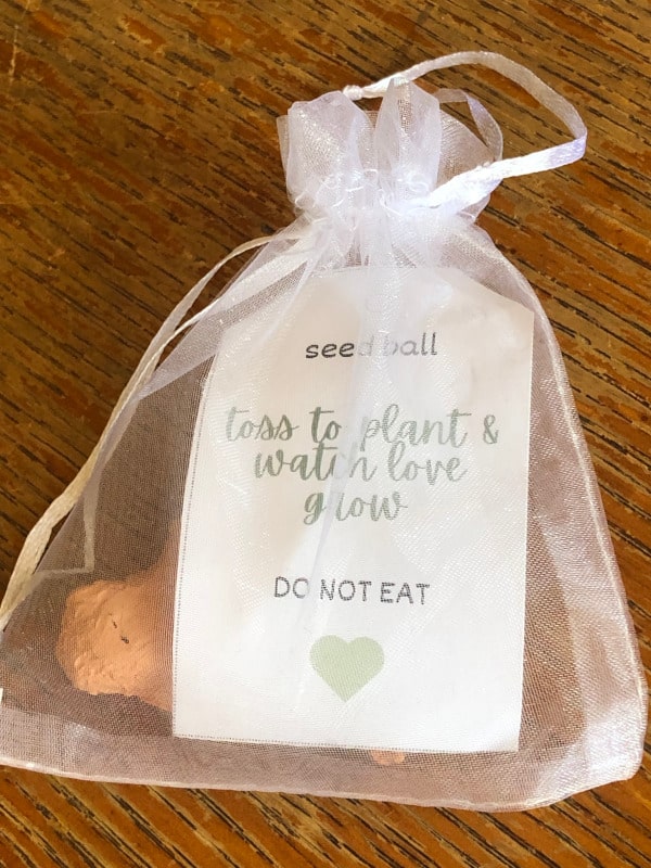 organza bag wedding favor with tag inside and seed ball