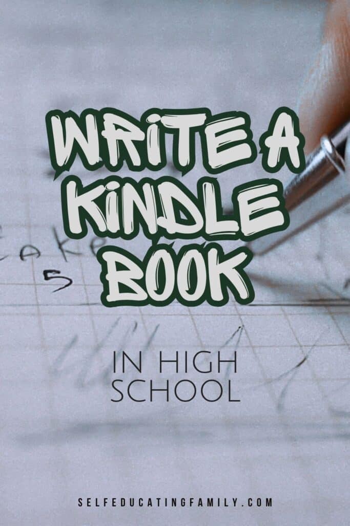 fingers holing pen and writing with text overlay "write a kindle book"