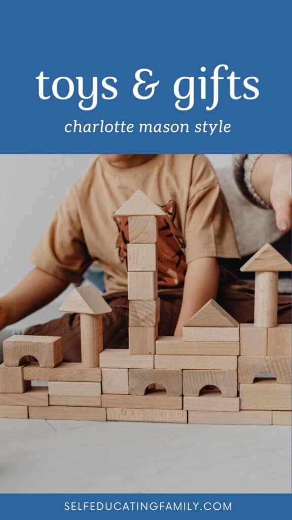 children building with wooden blocks