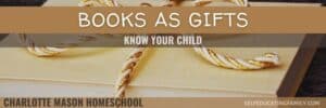 book with gold twine ribbon